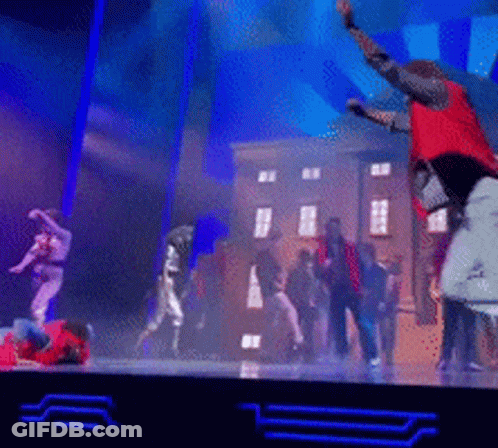 Group Dancing On Stage GIF
