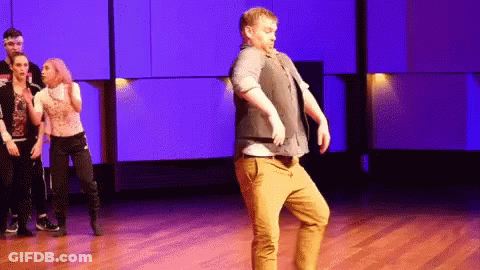 Group Dancing On Stage With Chicago Shirt GIF