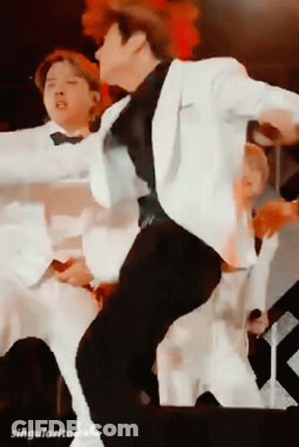 Group Dancing, One Singing On Stage GIF