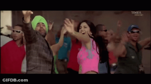 Group Dancing With Woman In Pink Top GIF