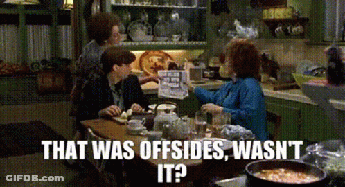 Group Eating Food And Drinking Tea In Kitchen GIF