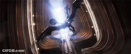 Group Flying Through Dark Tunnel GIF
