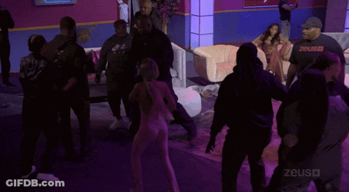 Group Gathered In Room With Zeus GIF