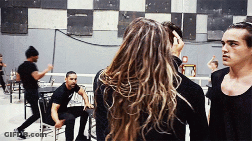 Group Gathered One Has Letter O On Chest GIF