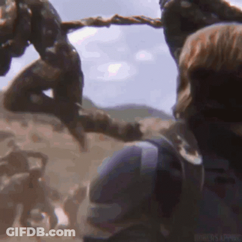 Group Holding Hands In Field GIF