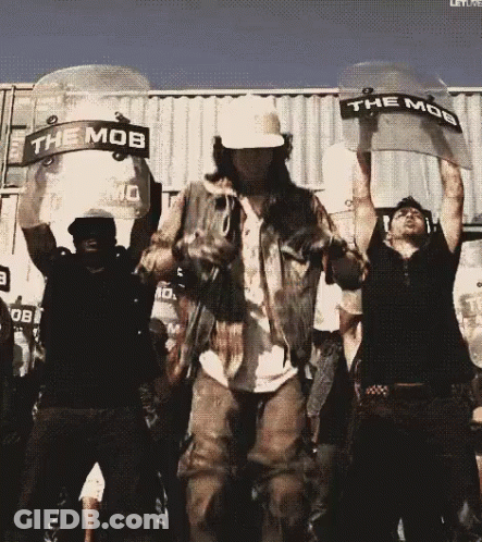 Group Holding Riot Shields Saying Mob GIF