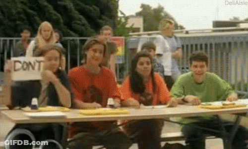 Group Holding Sign Saying Dont GIF