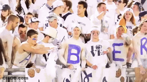 Group Holding Signs That Say Beer GIF