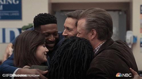 Group Hugging With NBC Logo GIF