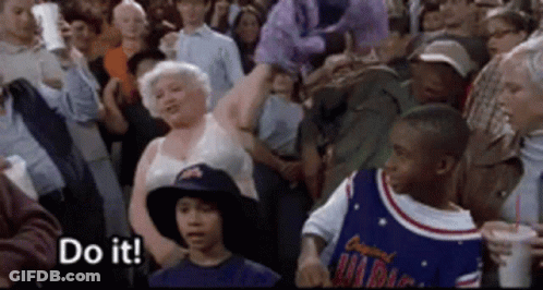 Group In Crowd Holding Sign Saying Do It GIF