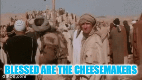 Group In Desert Blessed Are The Cheesemakers GIF