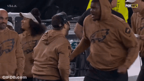 Group In Eagles Sweatshirts GIF