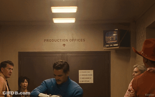 Group In Fantastic Four Costumes Running In Hallway GIF