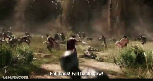 Group In Field Saying Fall Back Fall Back Now GIF