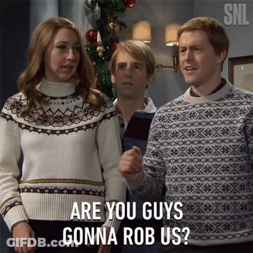 Group In Front Of Christmas Tree Saying Are You Guys Gonna Rob Us GIF