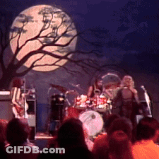 Group In Front Of House Man Wearing CBS Shirt GIF