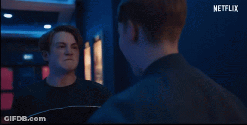 Group In Front Of Red Pilot Movie Poster GIF