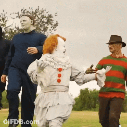 Group In Halloween Costumes Clown And Freddy Krueger GIF