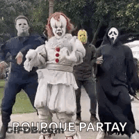 Group In Halloween Costumes Dancing Together GIF