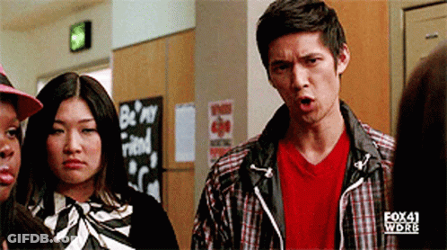 Group In Hallway With Be My Friend Sign GIF