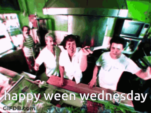 Group In Kitchen Saying Happy Ween Wednesday GIF