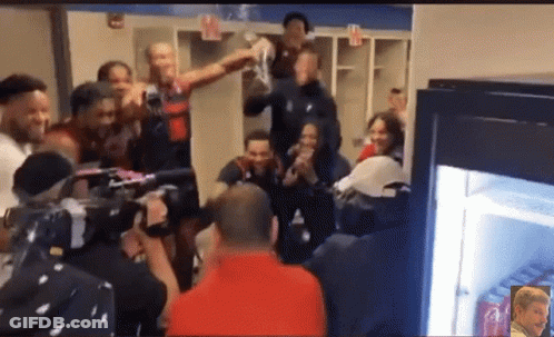 Group In Locker Room With Coca Cola Fridge GIF