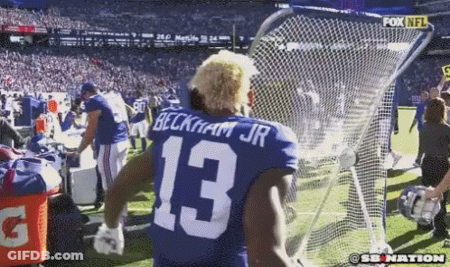 Group In Locker Room With Man In NFL Hoodie GIF