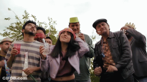 Group In Party Hats Saying Happy Birthday GIF