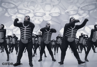 Group In Skeleton Costumes Dancing GIF