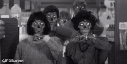 Group In Skeleton Masks Black And White Photo GIF