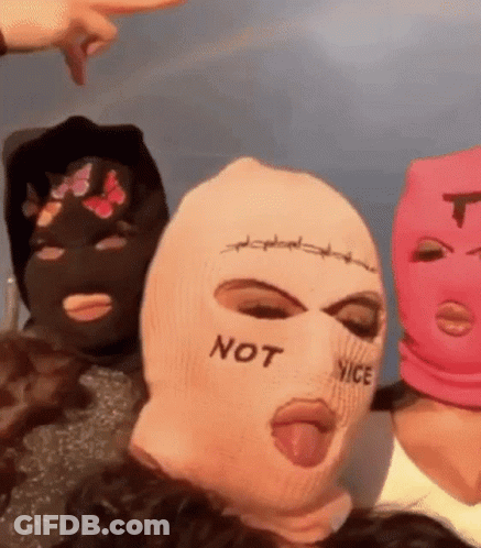 Group In Ski Masks Posing For Picture GIF