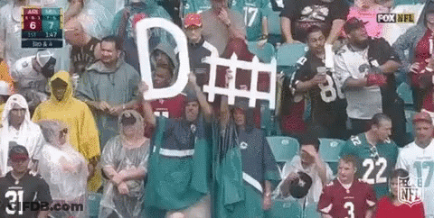 Group In Stadium Holding Sign Saying D GIF