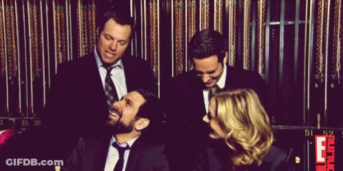 Group In Suits Laughing GIF