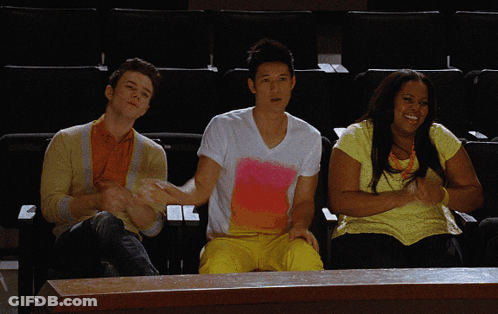 Group In Theatre One Wearing Yellow Shirt GIF