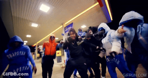 Group In Trapstar Sweatshirts Dancing At Gas Station GIF