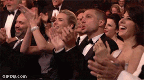 Group In Tuxedos Clapping GIF