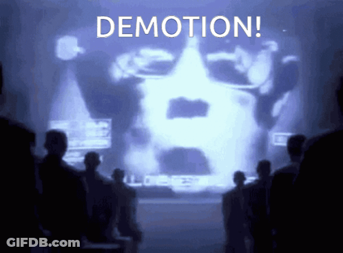 Group Looking At Screen Saying Demotion GIF