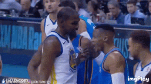 Group Of Basketball Players Standing Together GIF