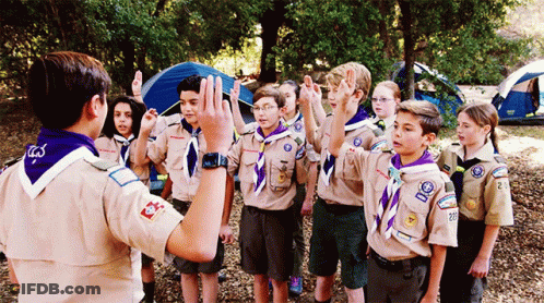 Group Of Boy Scouts Gathered In Circle GIF