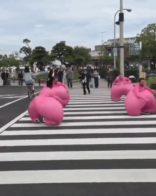 Group Of Boys Bounce It In Pedestrian Lane GIF