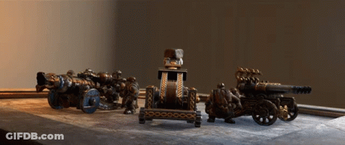Group Of Cannons On Wooden Table GIF