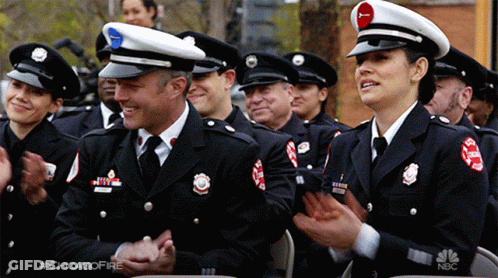 Group Of Chicago Firefighters Applauding In Uniforms GIF