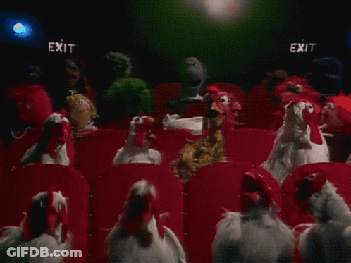 Group Of Chickens Watching Movie In Theater GIF