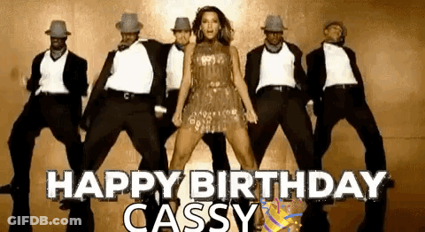 Group Of Dancers Dancing In Front Of Woman In Dress GIF