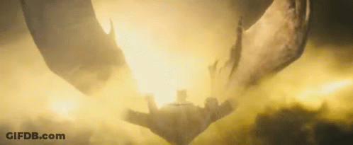Group Of Dragons Flying Over A Person GIF
