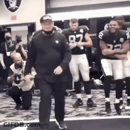 Group Of Football Players In Locker Room GIF