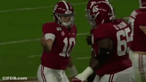 Group Of Football Players On Field GIF