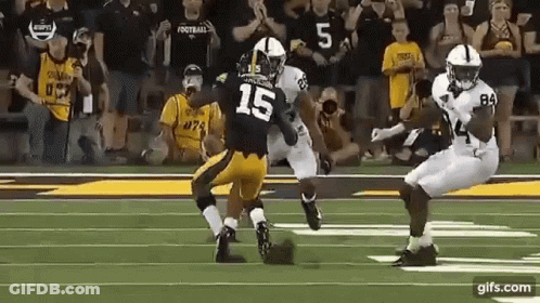 Group Of Football Players Playing On Field GIF