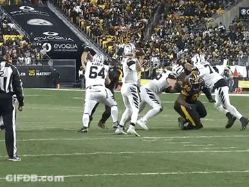 Group Of Football Players Playing With Referee GIF