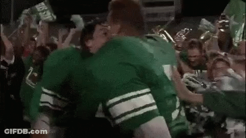 Group Of Football Players Standing Next To Each Other GIF